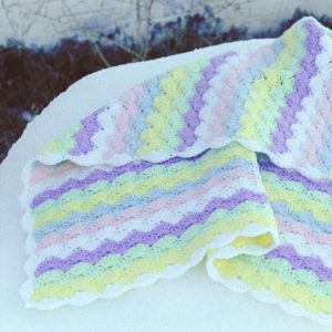 Crocheted rainbow baby afghan