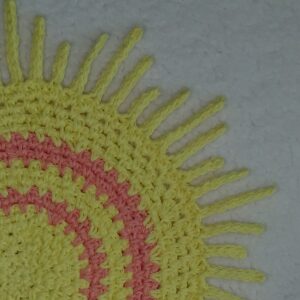 Sunray edging on the moss stitch circle